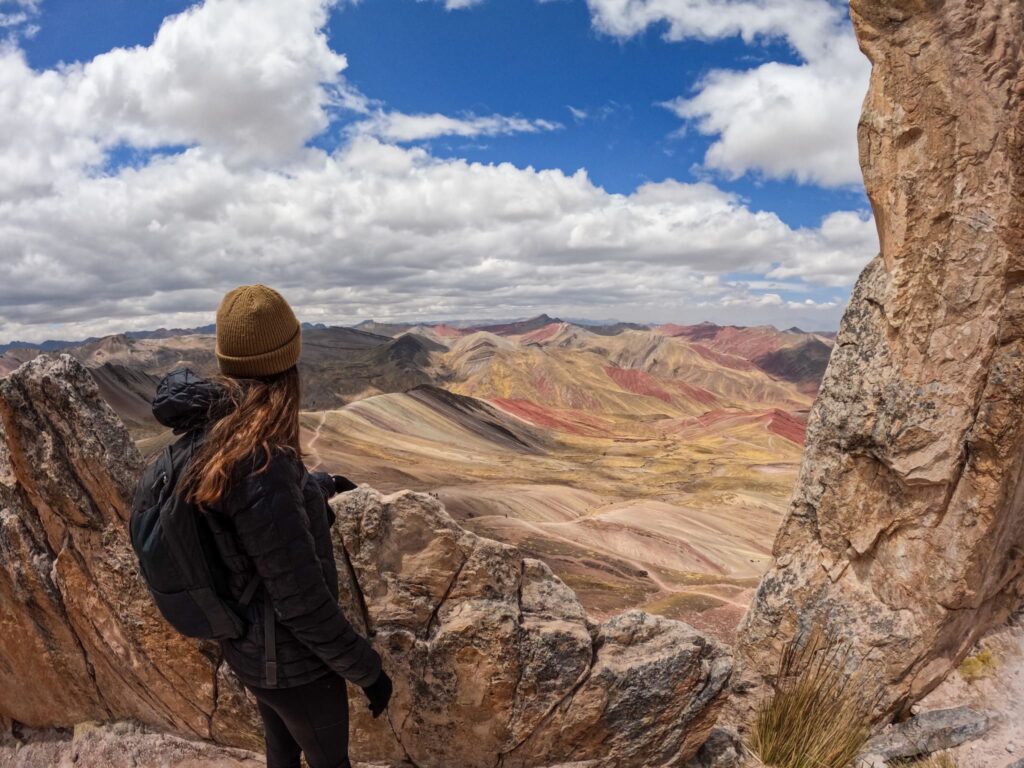 valentina standing on a rocky ledge